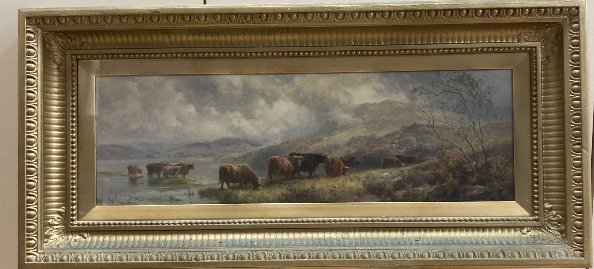 Edward Henry Holder (1847-1922), oil on board, Highland cattle watering, signed, 16 x 51cm